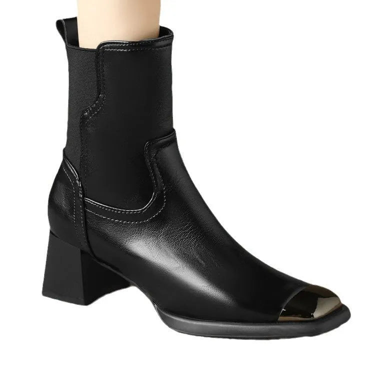 Brown women's high-heel Martin boots made of cowhide leather with a side zipper and decorative rivets.