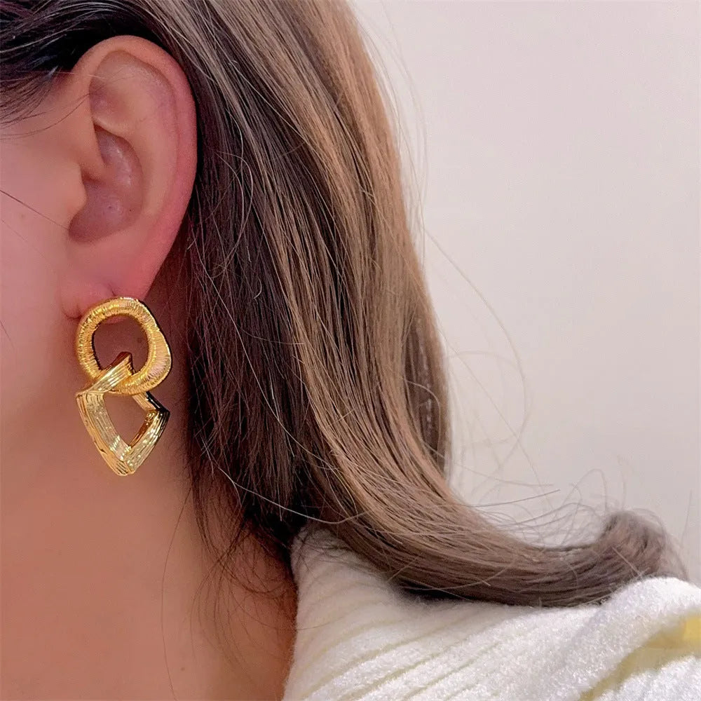 Retro geometric circle pendant earrings with 3.4 cm drop in gold or silver electroplated finish