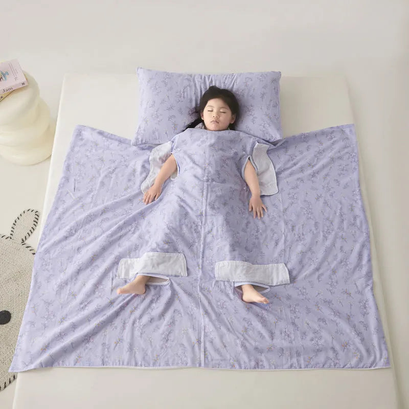 Anti-kick sleeping bag blanket in a choice of colours and sizes on a bed.