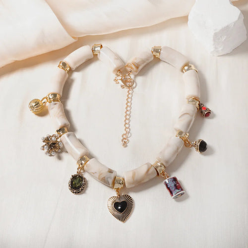 Women's bamboo design resin heart necklace with electroplated finish on adjustable chain