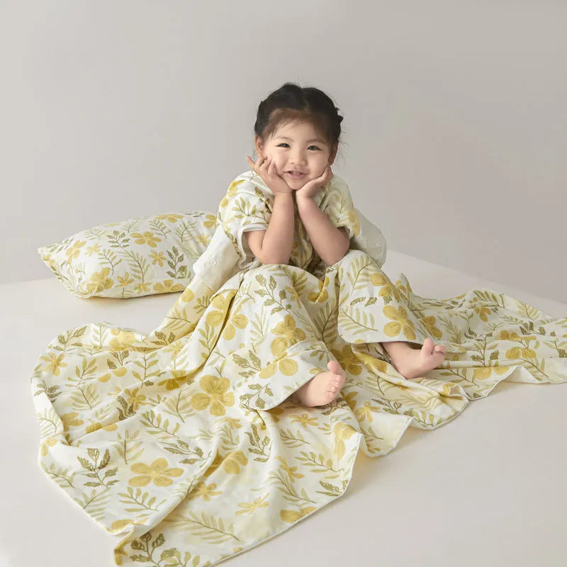 Anti-kick sleeping bag blanket in a choice of colours and sizes on a bed.