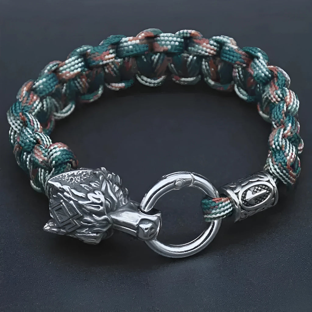 Handmade titanium steel wolf head bracelet with Luen character, polished finish, camouflage colour on white background