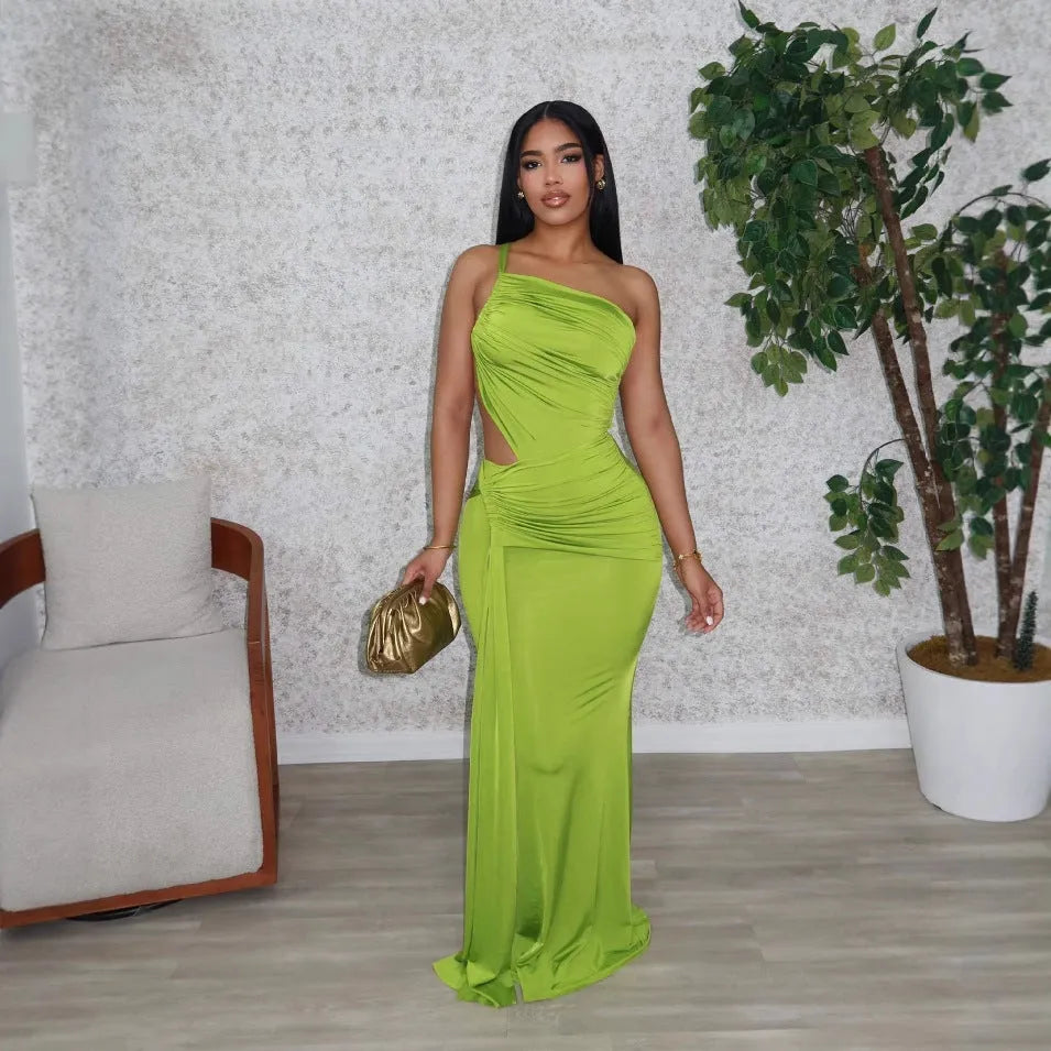 Women's one shoulder pleated maxi dress in green with sleeveless design and hip skirt cut