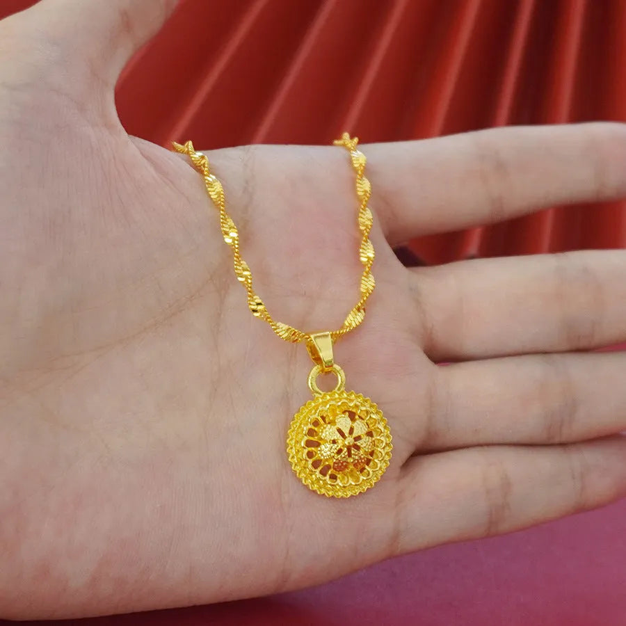 Landscape Middle East gold-plated floral jewellery three-piece set showing necklace, earrings and ring