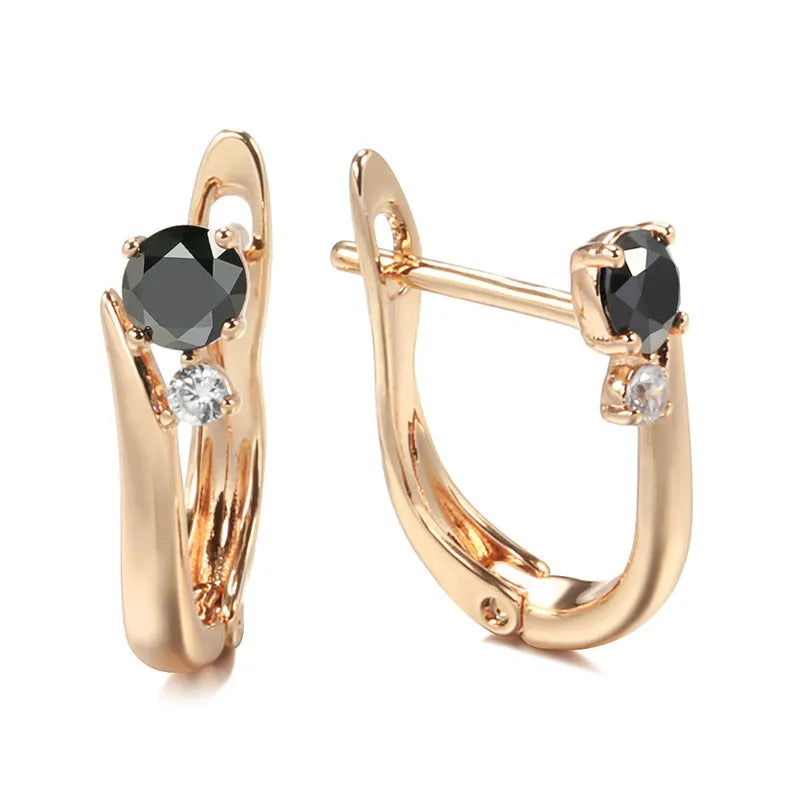 Women's black agate geometric drop earrings with gold plating and ear clip fastening