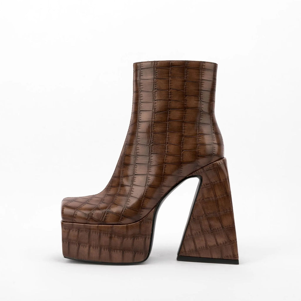 Women's ankle boots with a high heel in red, green, black, beige, and brown colours.