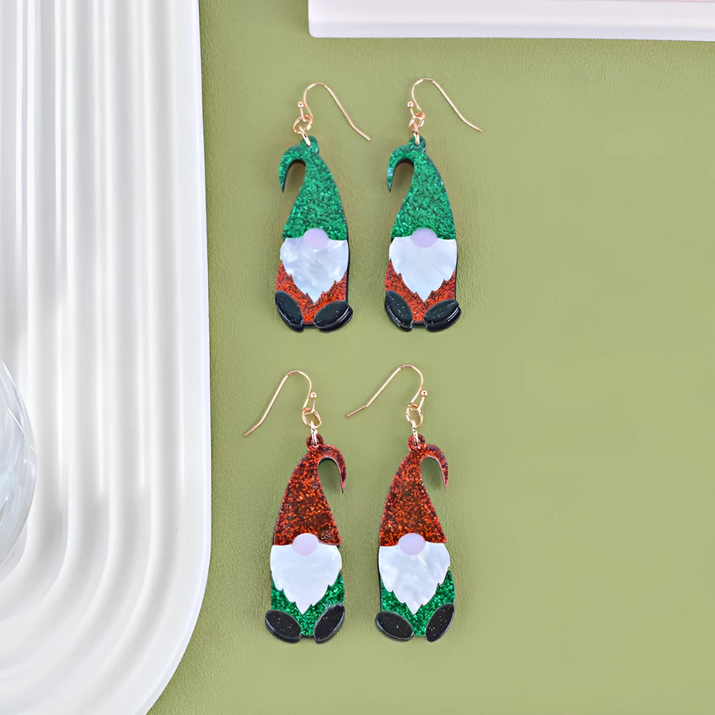 Acrylic cartoon Santa Claus earrings showing red, green, and red/green hat style options.