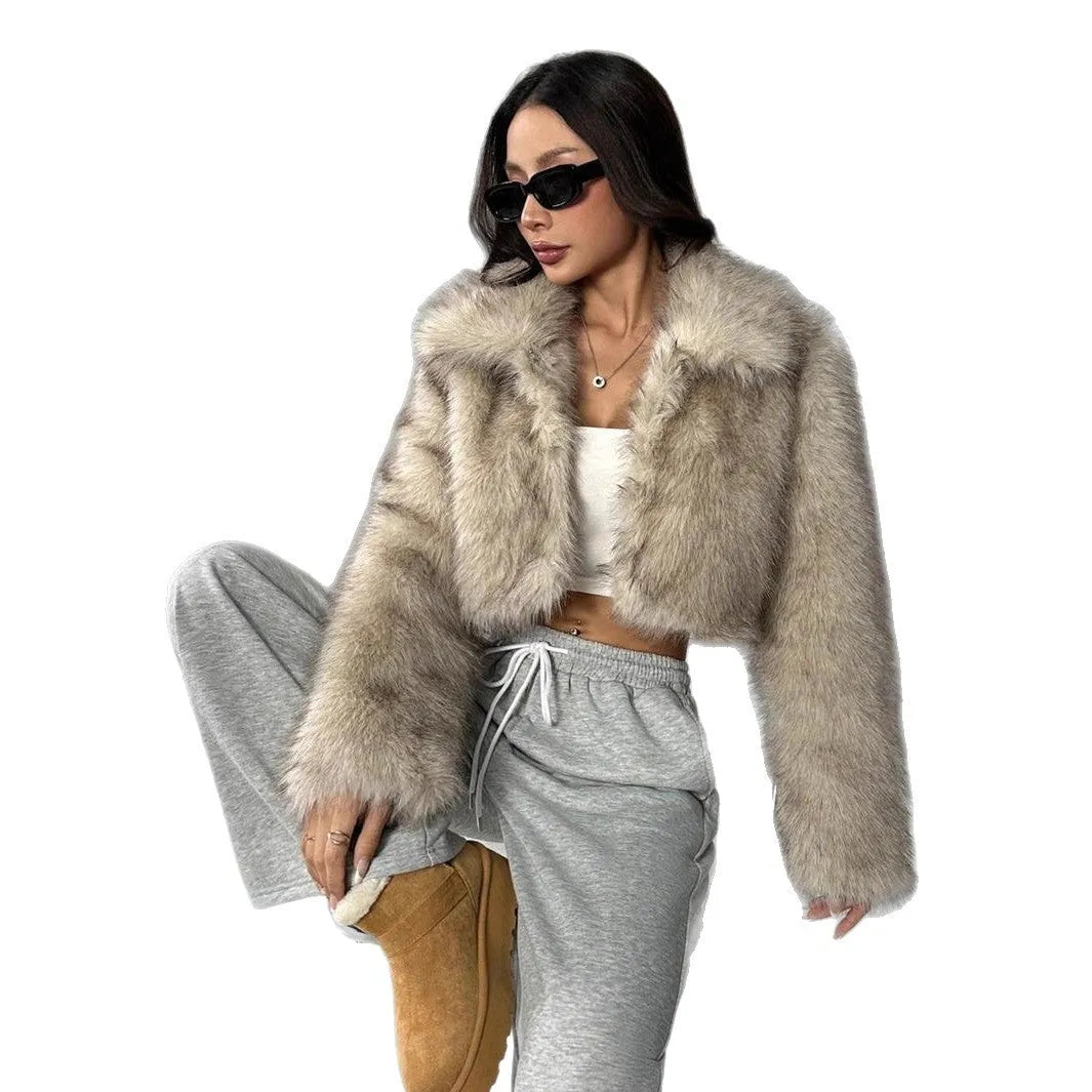 A woman's short-length artificial fur coat with a faux fur collar in a plush grey Maojian tea colour.