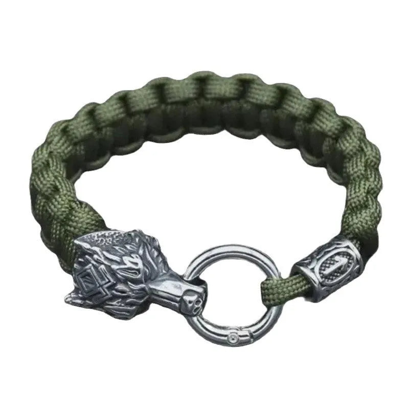 Handmade titanium steel wolf head bracelet with Luen character, polished finish, camouflage colour on white background