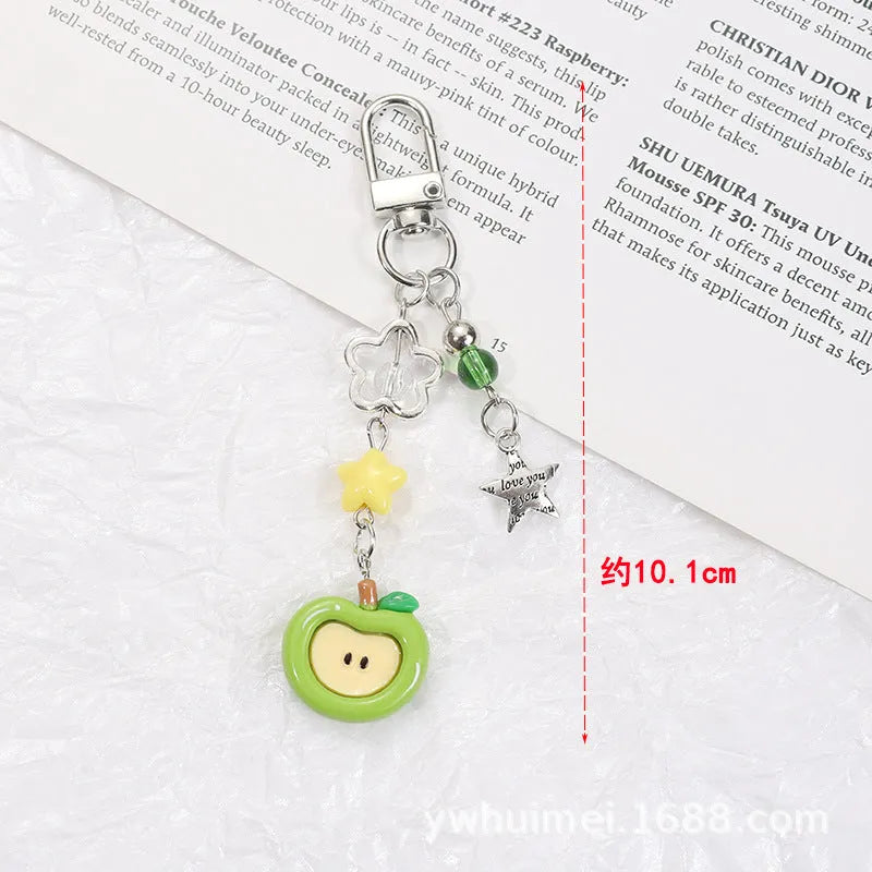 Plastic resin phone charm keychain with semi-handmade apple and strawberry fruit designs