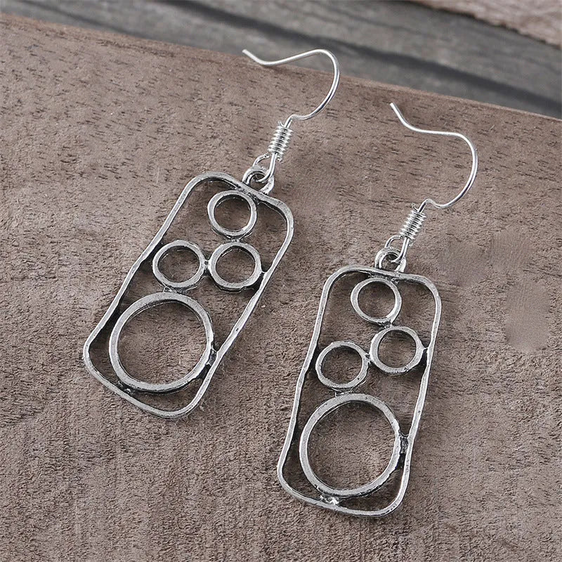 Geometric round earrings in antique silver finish made from zinc alloy for men and women