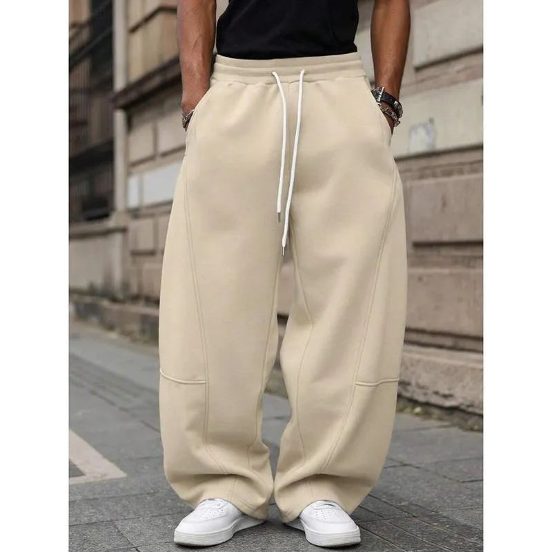 Men's straight-leg high-waist trousers in a cropped length, shown in a dark grey colour.