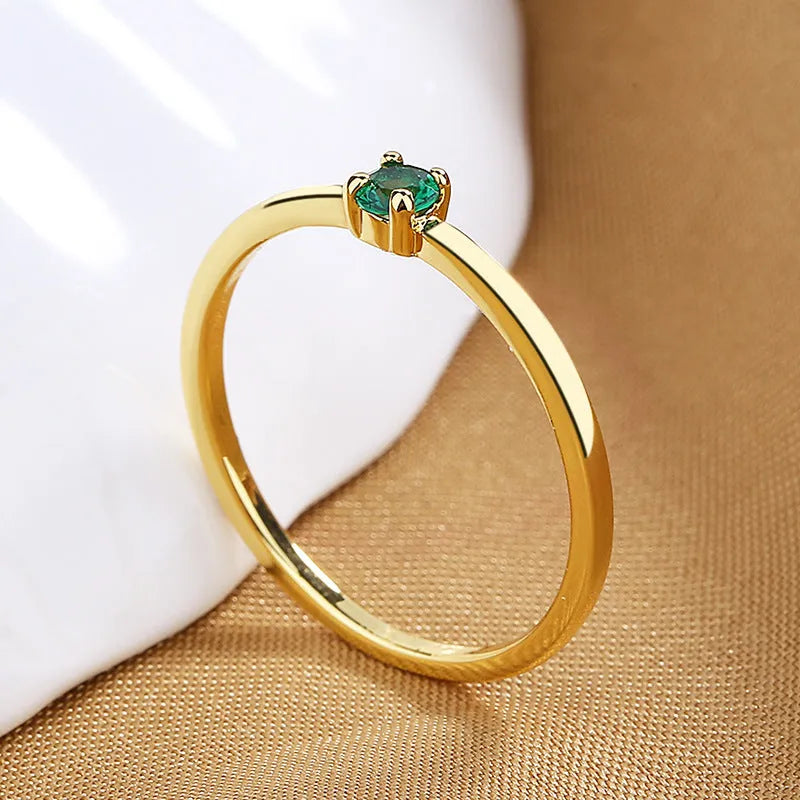 Women's twin style copper geometric fine circle ring with a single diamond, shown in available colours.