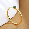 Women's twin style copper geometric fine circle ring with a single diamond, shown in available colours.