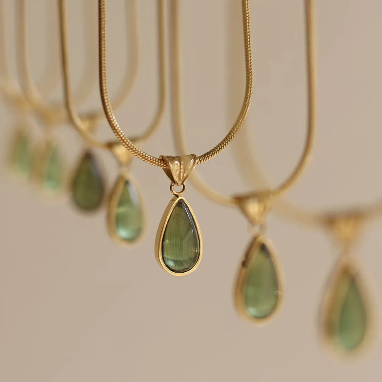 Retro water drop necklace with titanium steel chain and blue or green gemstone pendant