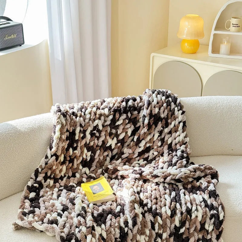 Handmade thick chenille stripe blanket in 130x170cm size shown in caramel mango colour.