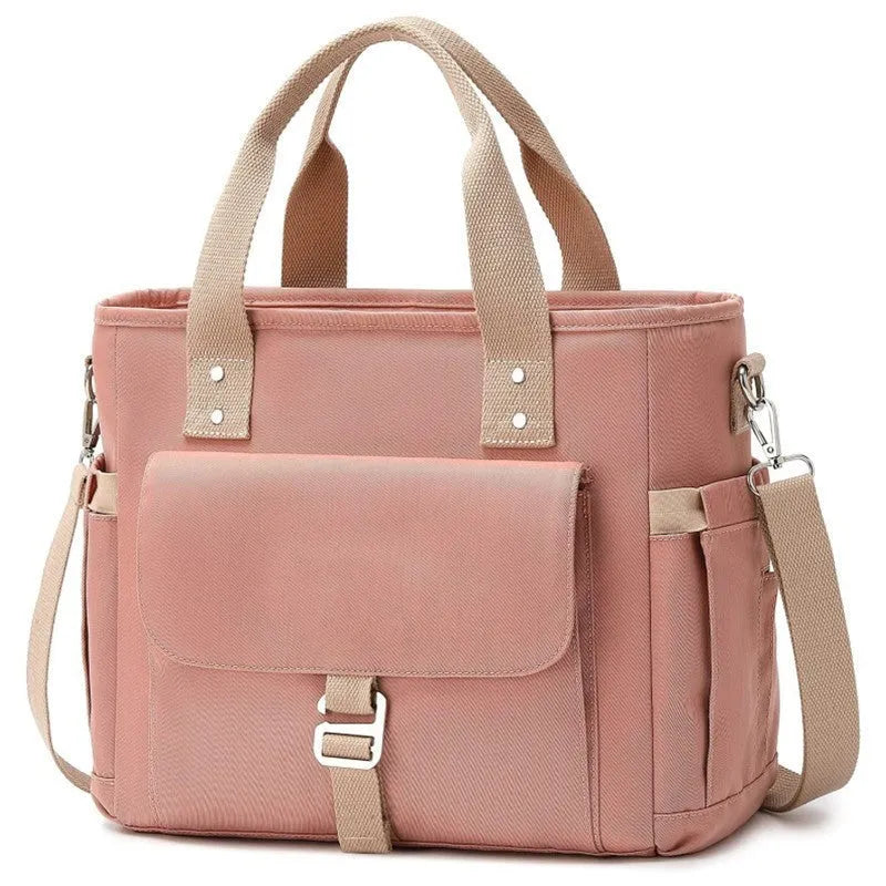 Insulated Oxford cloth picnic bag with removable shoulder strap and side pocket in black, green, or pink.