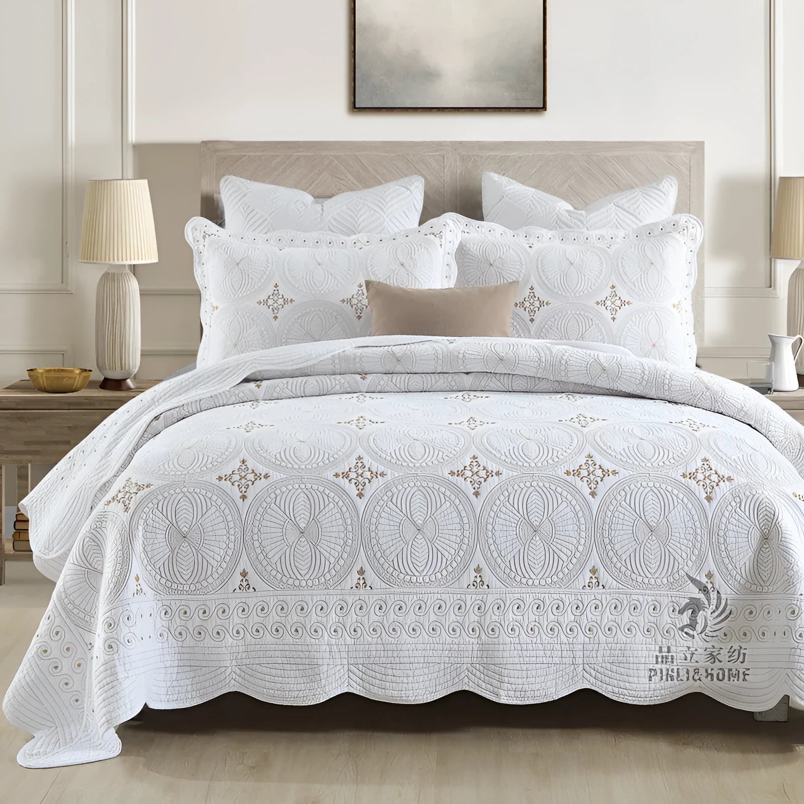 European-style embroidered pure cotton bed cover set with two pillowcases on a bed.