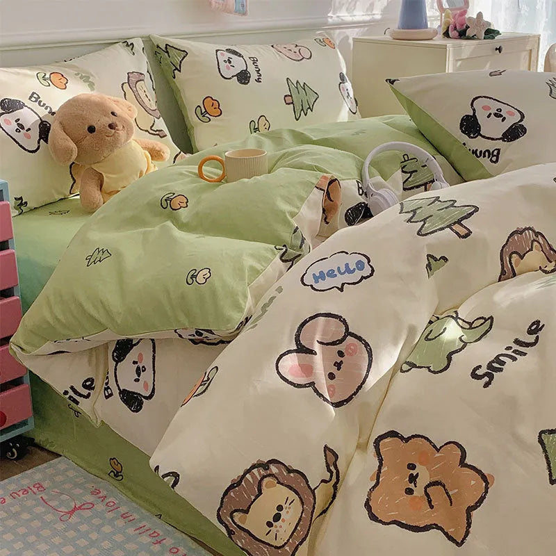 Cartoon dog pattern pure cotton duvet cover set with matching fitted sheet and pillowcases on a bed.