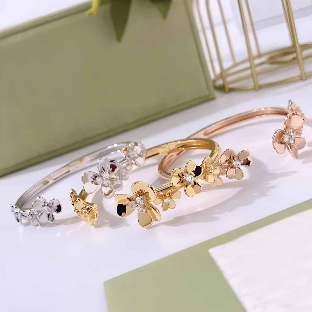 Three-leaf flower bracelet with micro inlaid zircon stones, copper base, electroplated in gold, silver, or rose gold