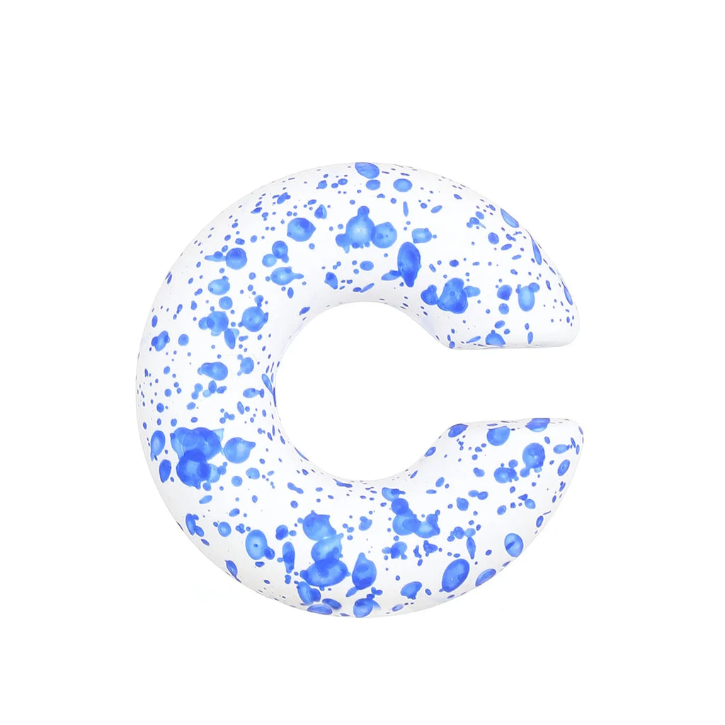 Round C-shaped clip-on earring with a matte coarse surface in a selection of candy colours.