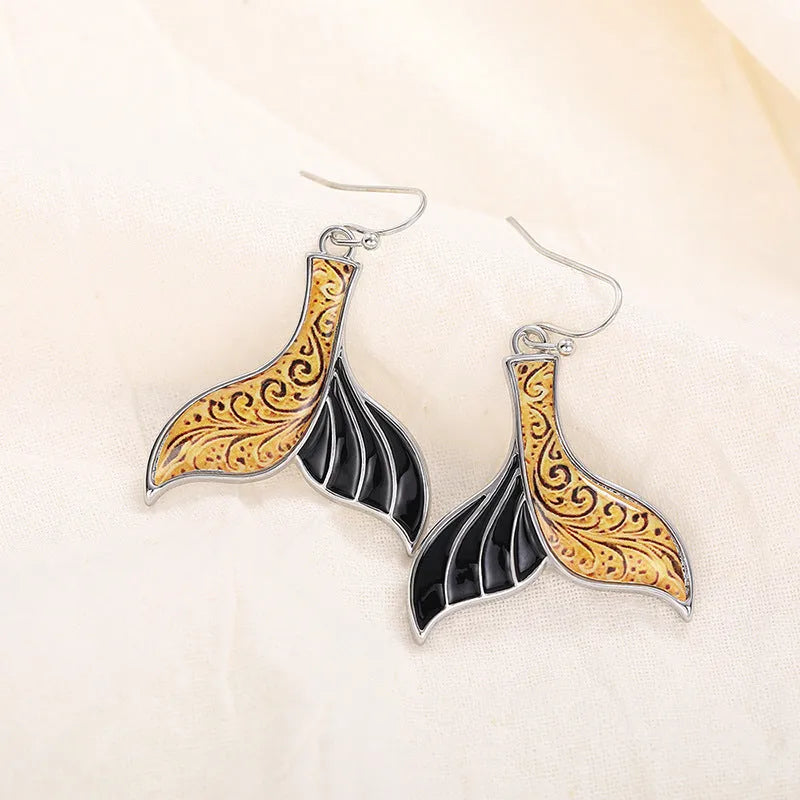 Women's white gold colour alloy fishtail earrings with whale design and retro styling