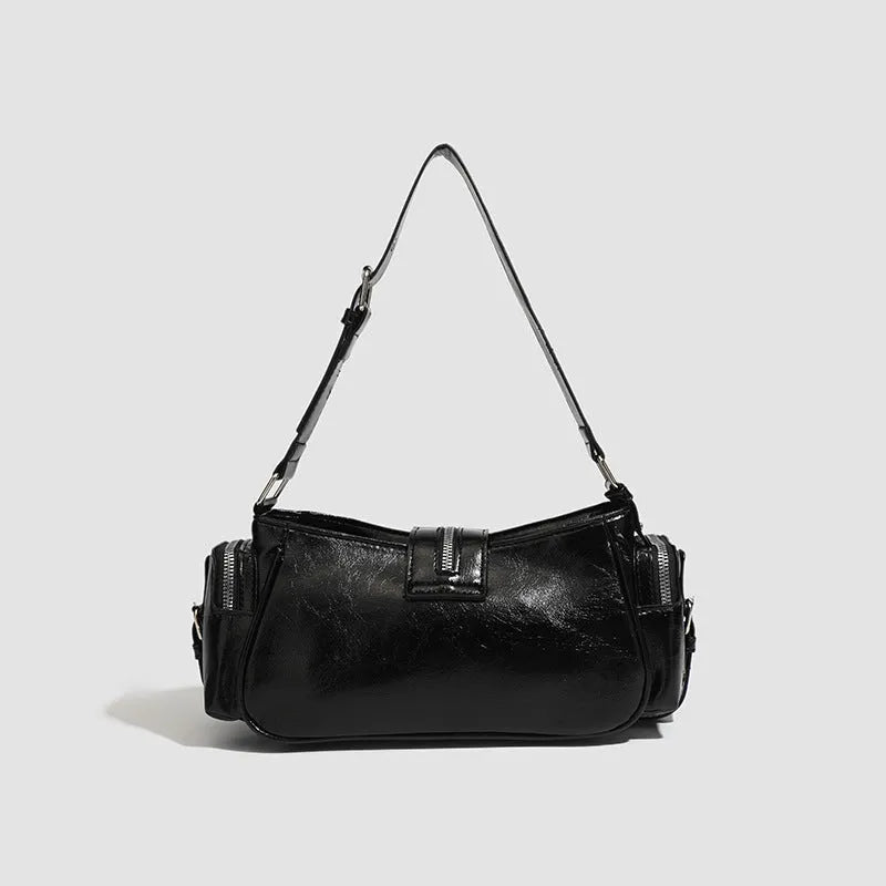Black retro oil-wax leather shoulder bag with dumpling shape and multiple compartments