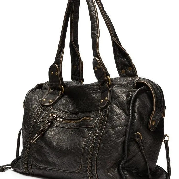 Women's brown soft PU leather retro messenger bag with a single shoulder strap and woven detail.