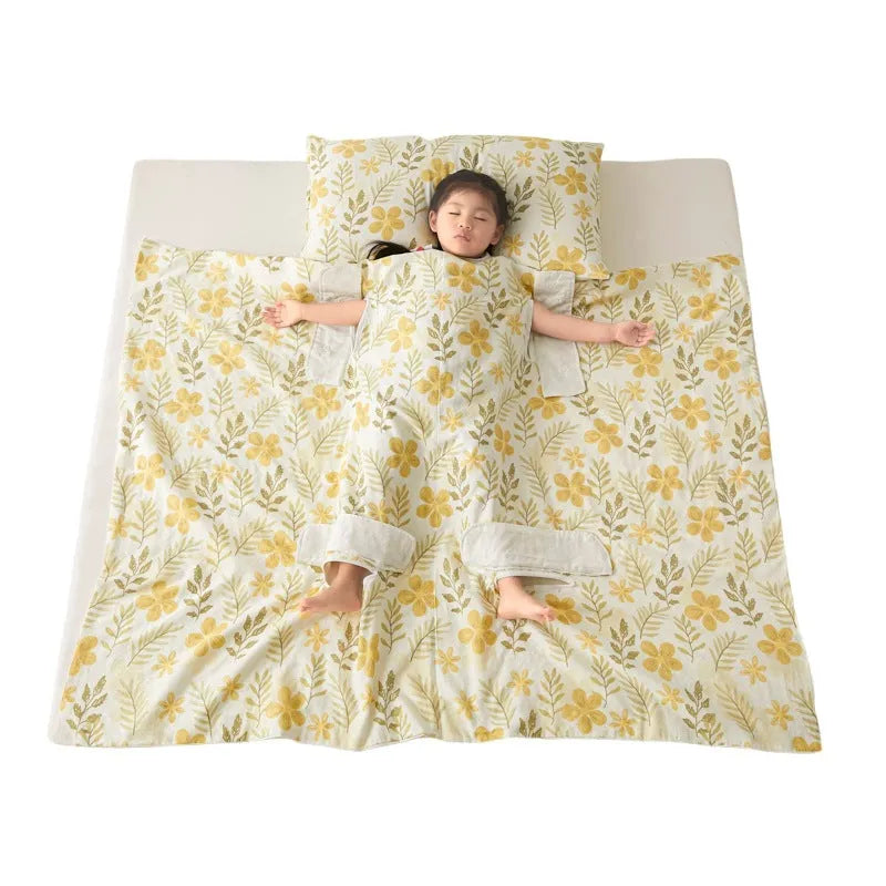 Anti-kick sleeping bag blanket in a choice of colours and sizes on a bed.