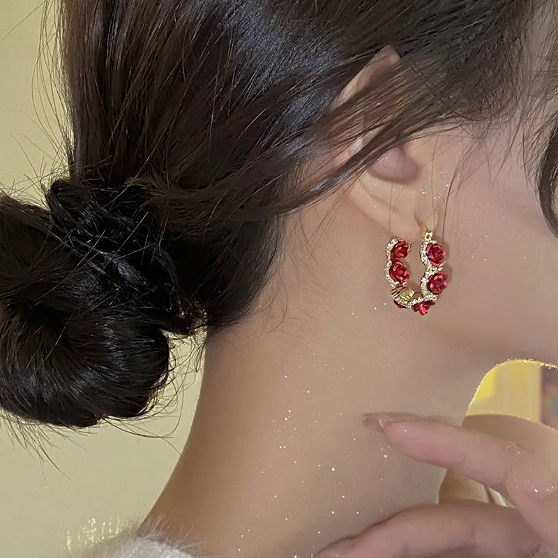 Red alloy ear clips with rose flower design for women's clip-on jewellery