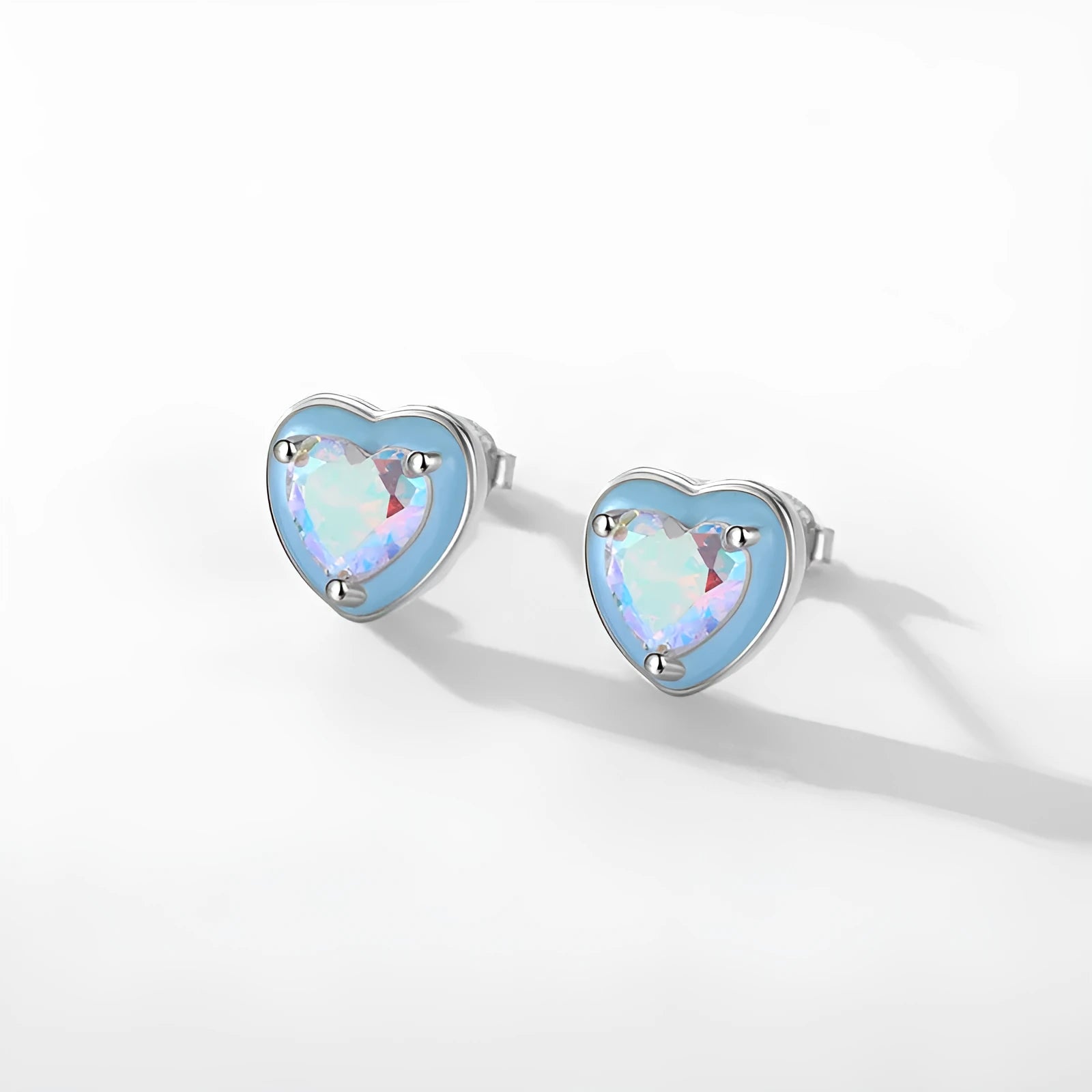 S925 sterling silver heart-shaped stud earrings with colourful zircon mosaic and epoxy accents on silver background