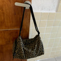 Leopard print cross-body shoulder messenger bag with sports styling and large capacity design