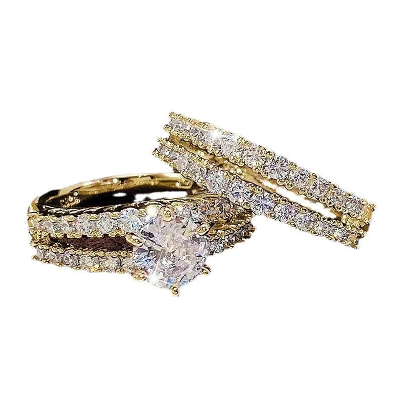 2 in 1 fully jewelled female fashion ring set in silver, gold, and rose gold on a geometric background.