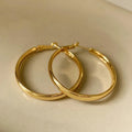 Gold and silver metal circle hoop earrings with 40mm diameter measurement