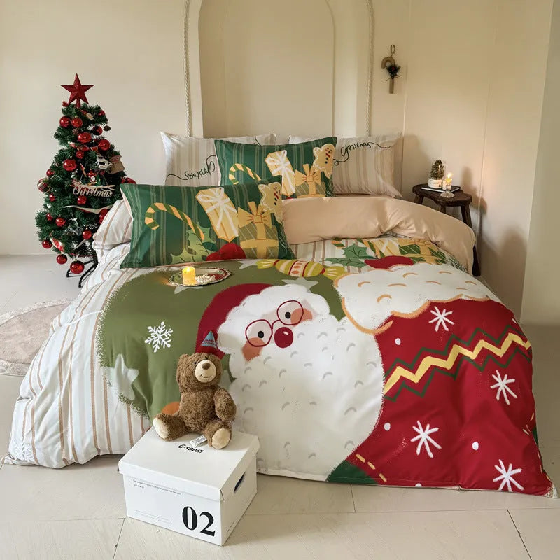Cartoon Christmas duvet cover and pillowcase set in red and green on a bed.