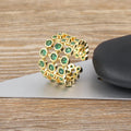 Copper 18K real gold plated wide band ring with green zircon centrepiece.