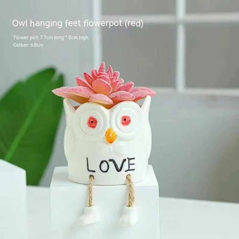 Ceramic hanging foot flowerpot in a cartoon style, shown as a desktop planter for succulent plants.