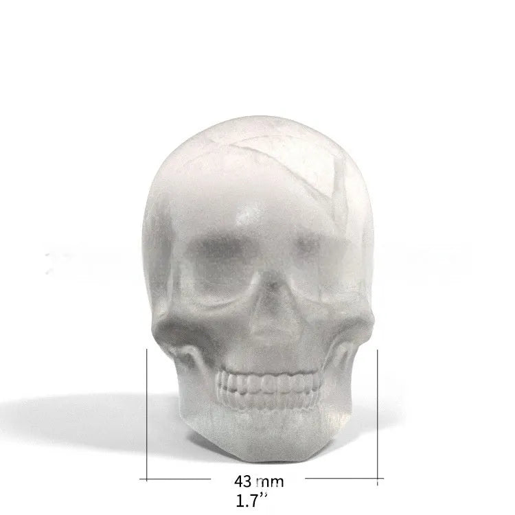 Food grade silicone Halloween ice tray creating 3D skull shaped ice cubes.