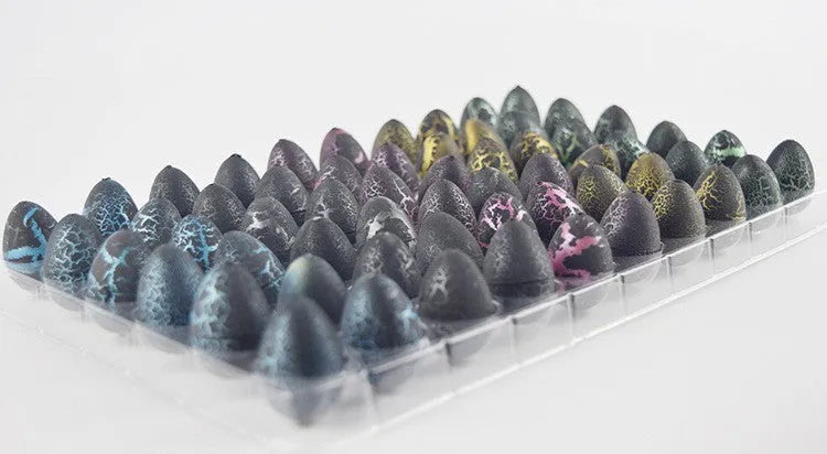 Dinosaur embryonated egg hydrophilic expansion educational toy in black crack finish, size 2x3cm, made of EVA.