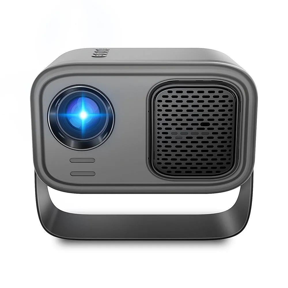 Black portable smart HD projector with remote control on a desk.