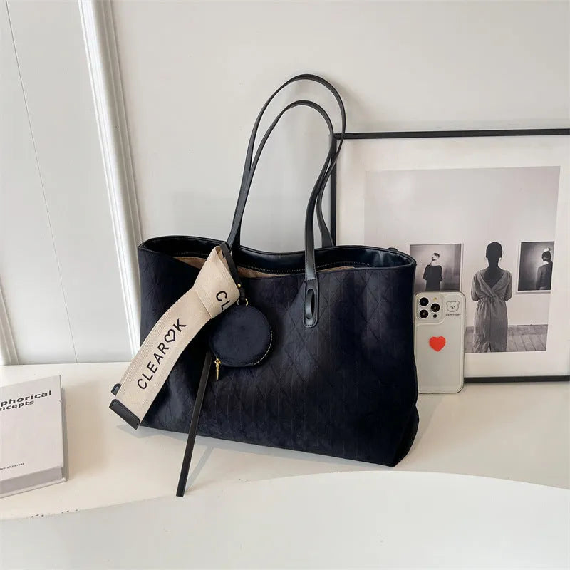 Large soft polyester shoulder tote bag in horizontal square shape with zippered internal compartment