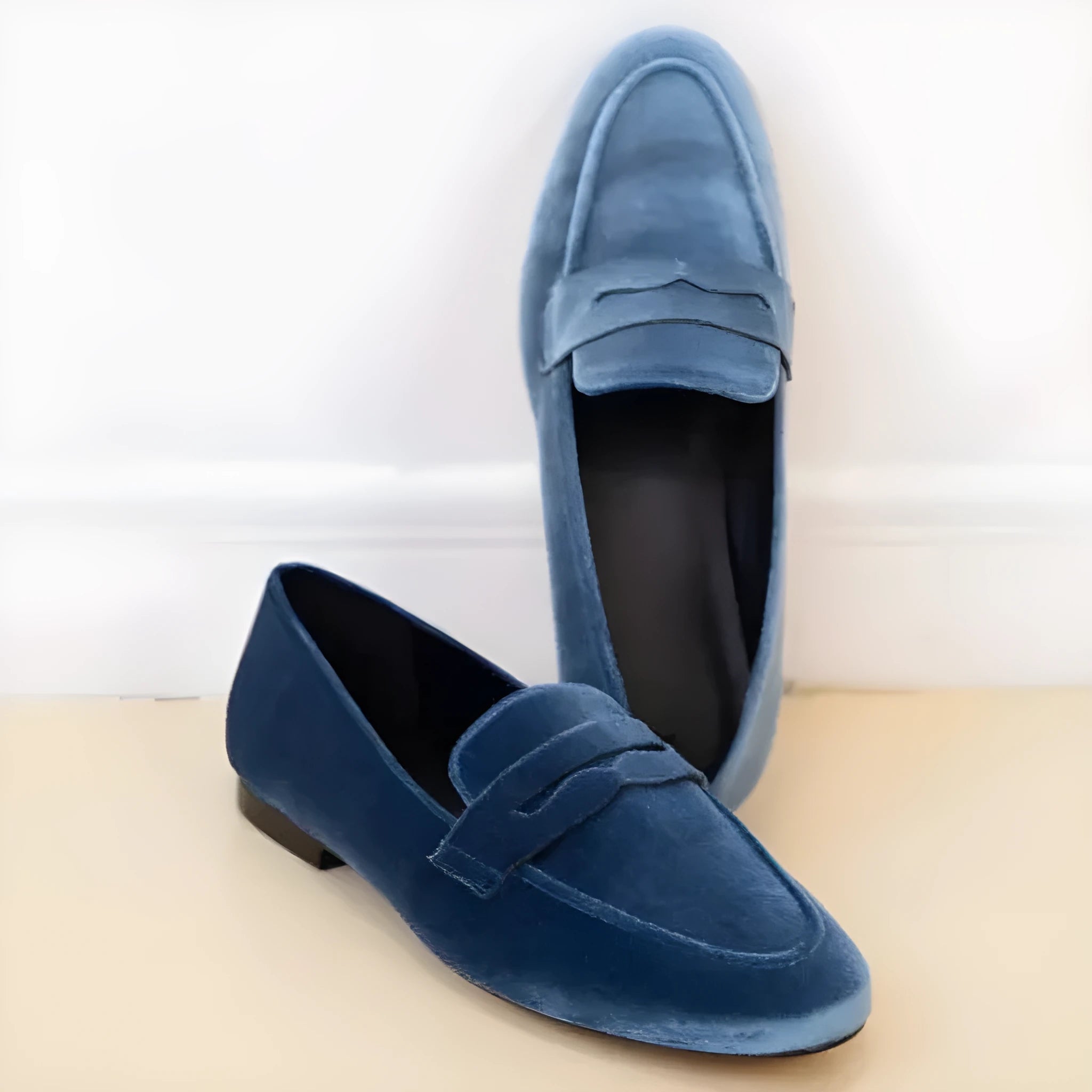 Blue and black sole women's plus size flat loafers with a suede-like PU upper and rubber sole.