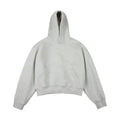 Man wearing a dark grey Chinese cotton composite hooded sweater with a removable hood in street fashion style.