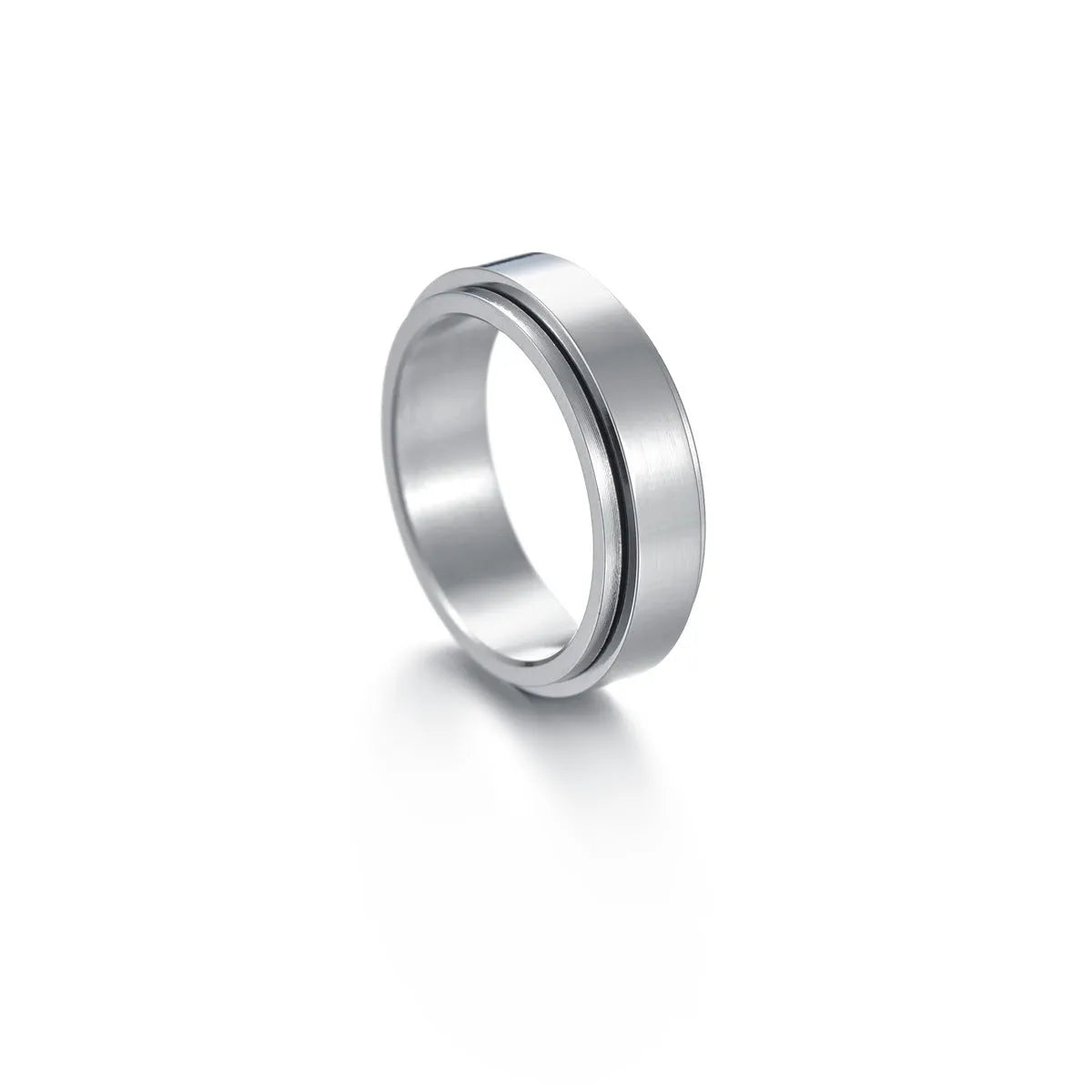 Titanium steel star moon ring in glossy finish on a neutral background, showing celestial motif and band width