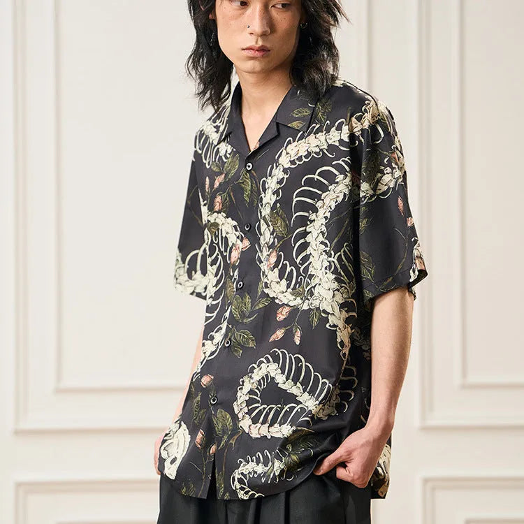 Short sleeve loose fit Cuban collar shirt with snake bone and floral printed pattern in various colours.