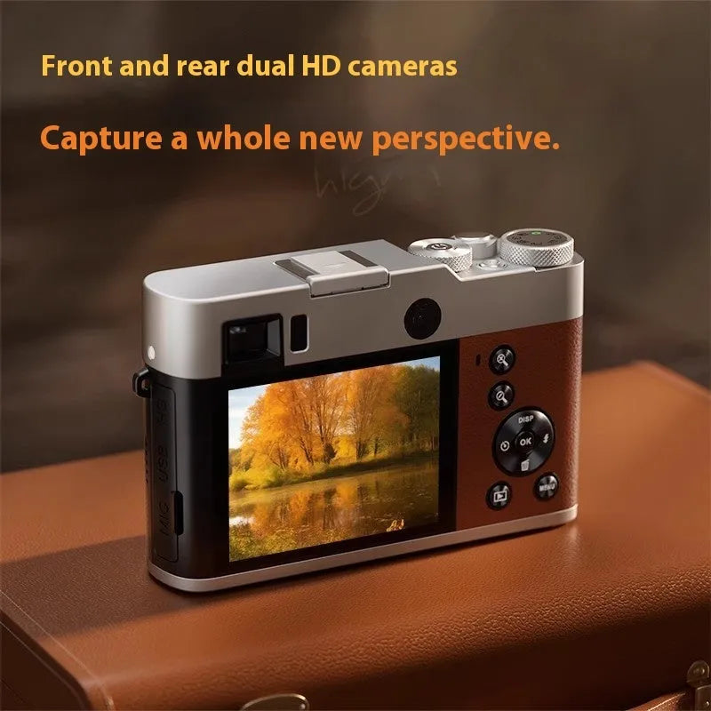 Black 5K digital camera with front and rear lenses, optical viewfinder, and a 2.88-inch display screen on the back.