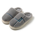 Women's indoor furry slippers in solid colour with plush upper and rubber sole for winter warmth