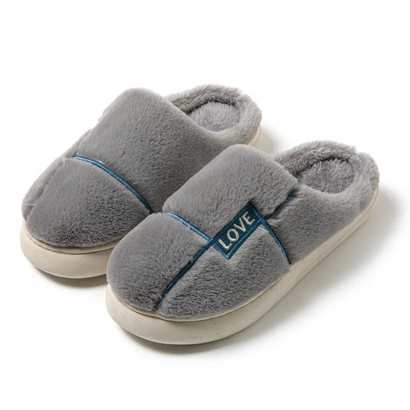 Women's indoor furry slippers in solid colour with plush upper and rubber sole for winter warmth