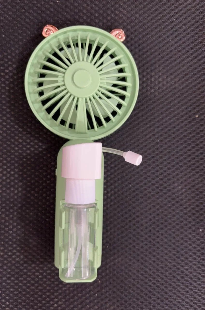 Portable plastic USB desk fan in a choice of apricot, blue, green, orange, or pink colours.