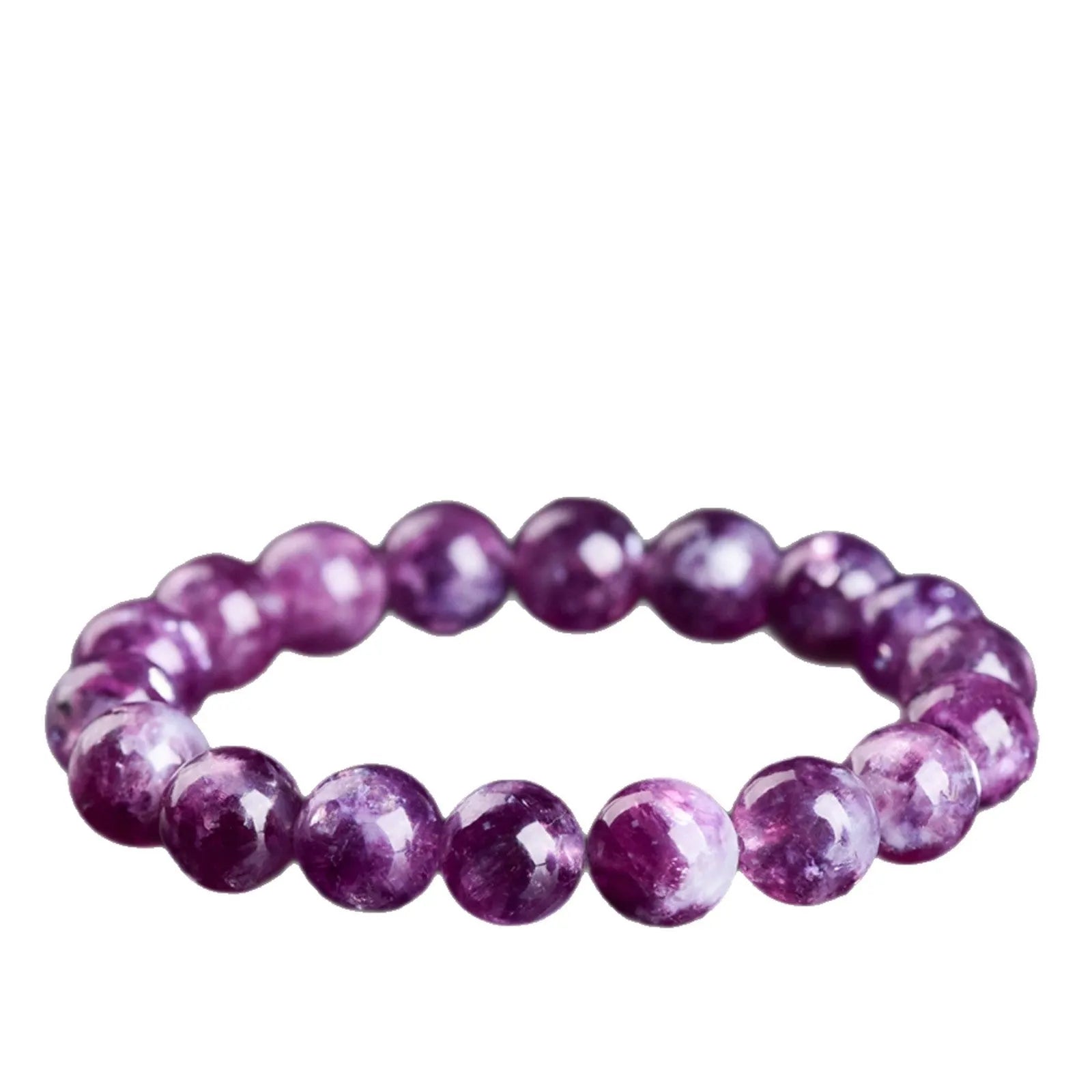 Polished purple and pink crystal grandmother bracelet with geometric beads on a wrist, showing Korean-style unisex design.
